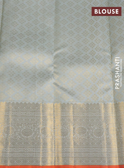 Pure kanchipuram silk saree pastel blue shade and orange with zari woven buttas and rich zari woven border