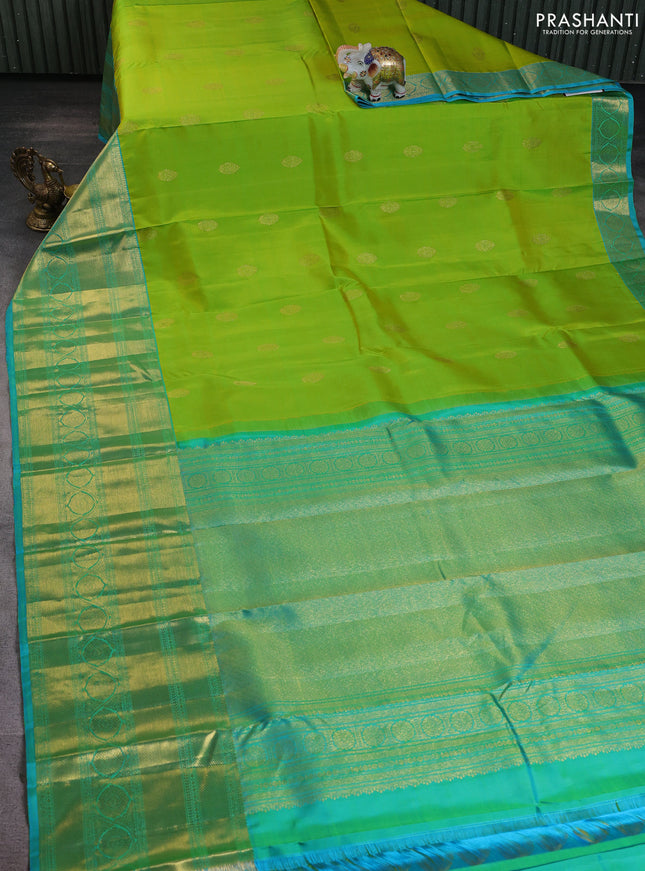 Pure kanchipuram silk saree fluorescent green and teal blue with zari woven buttas and long zari woven border