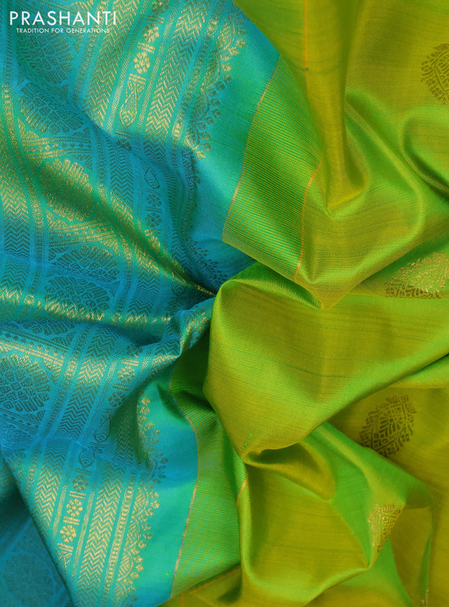 Pure kanchipuram silk saree fluorescent green and teal blue with zari woven buttas and long zari woven border