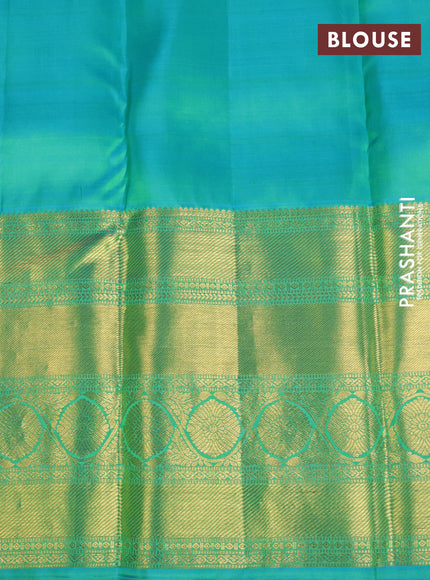 Pure kanchipuram silk saree fluorescent green and teal blue with zari woven buttas and long zari woven border