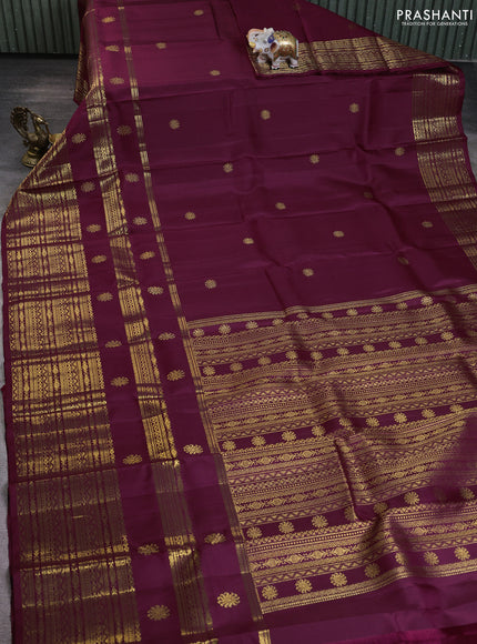 Pure kanchipuram silk saree wine shade with zari woven buttas and long zari woven border