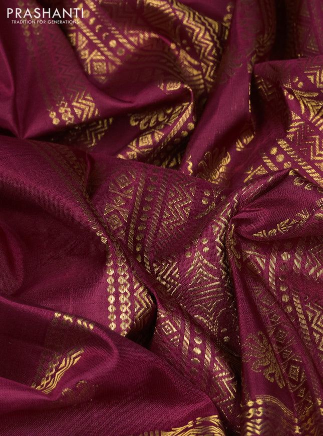 Pure kanchipuram silk saree wine shade with zari woven buttas and long zari woven border