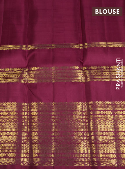 Pure kanchipuram silk saree wine shade with zari woven buttas and long zari woven border