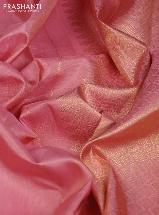 Pure kanchipuram silk saree peach shade with annam & rudhraksha zari woven buttas and long zari woven border