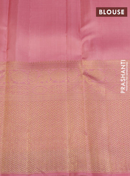 Pure kanchipuram silk saree peach shade with annam & rudhraksha zari woven buttas and long zari woven border