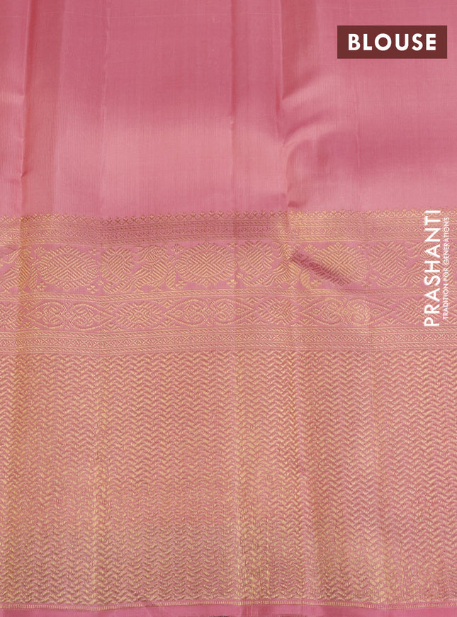 Pure kanchipuram silk saree peach shade with annam & rudhraksha zari woven buttas and long zari woven border