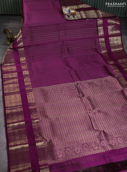 Pure kanchipuram silk saree purple with allover zari checks & buttas and long rettapet zari woven border