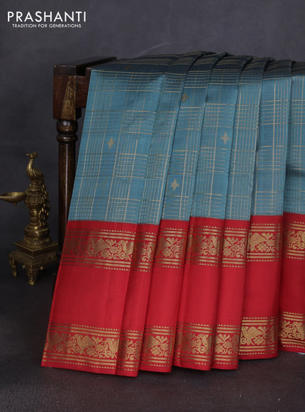 Pure kanchipuram silk saree pastel blue shade and red with allover zari checks & buttas and long zari woven border