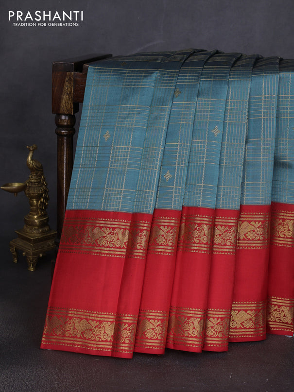 Pure kanchipuram silk saree pastel blue shade and red with allover zari checks & buttas and long zari woven border