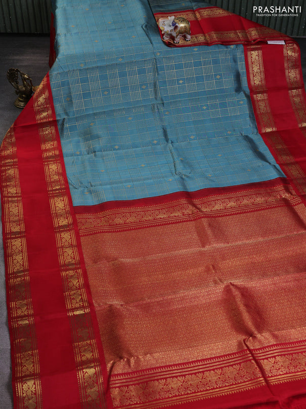 Pure kanchipuram silk saree pastel blue shade and red with allover zari checks & buttas and long zari woven border