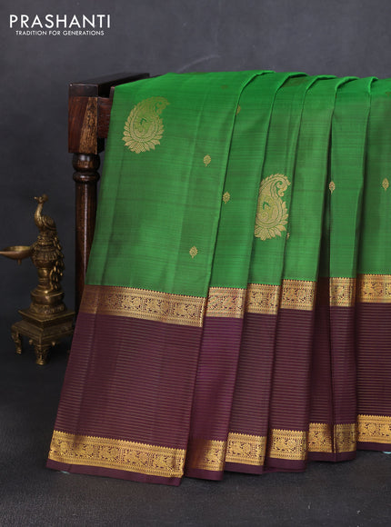Pure kanchipuram silk saree green and deep wine shade with zari woven buttas and long rich zari woven border