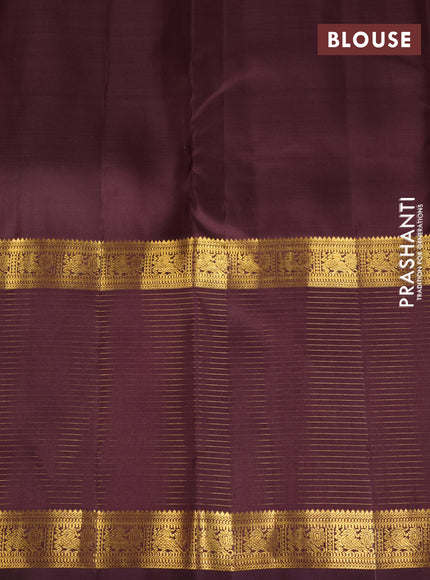 Pure kanchipuram silk saree green and deep wine shade with zari woven buttas and long rich zari woven border