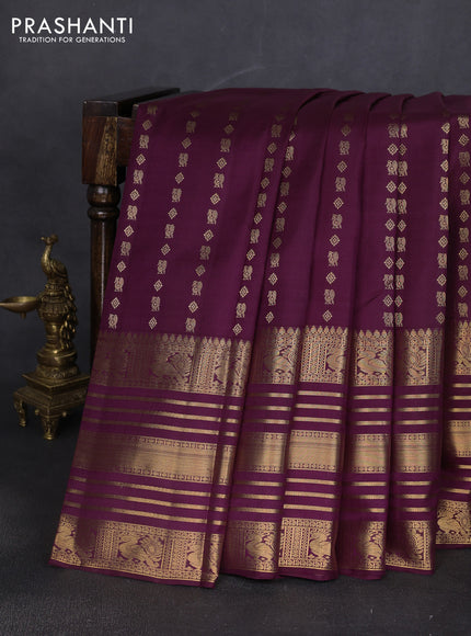 Pure kanchipuram silk saree wine shade with allover zari woven butta weaves and long rich zari woven border