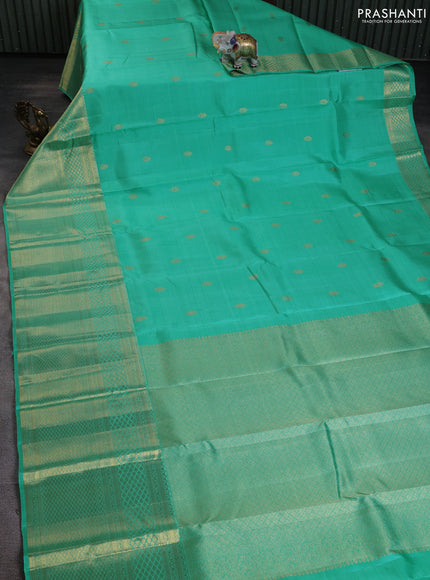 Pure kanchipuram silk saree teal blue with zari woven buttas and long rich zari woven border