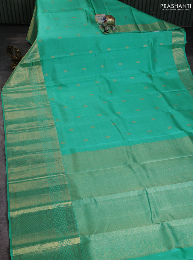 Pure kanchipuram silk saree teal blue with zari woven buttas and long rich zari woven border