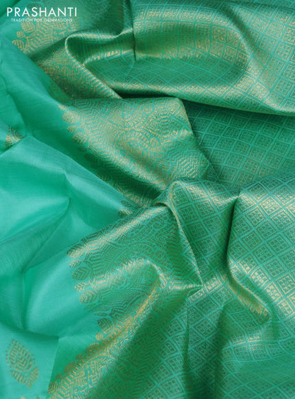 Pure kanchipuram silk saree teal blue with zari woven buttas and long rich zari woven border