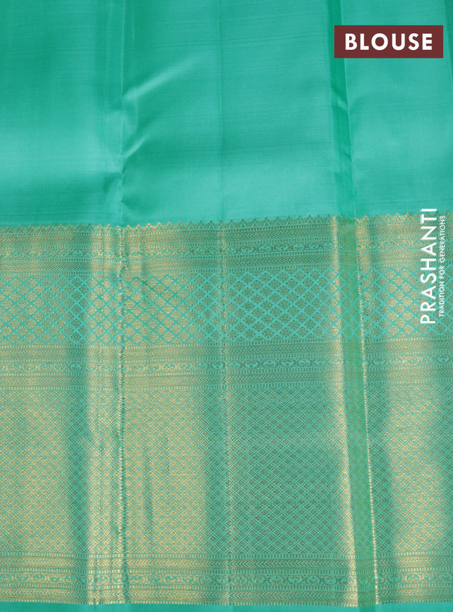Pure kanchipuram silk saree teal blue with zari woven buttas and long rich zari woven border