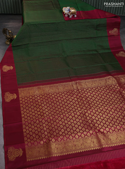 Pure kanchipuram silk saree green and dark pink with allover zari woven checked pattern and zari woven butta border