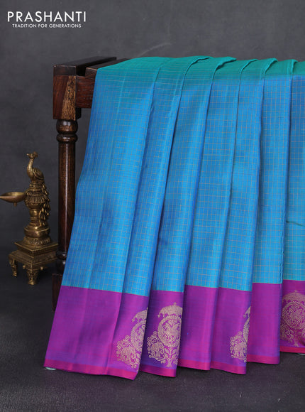 Pure kanchipuram silk saree cs blue and purple with allover zari woven checked pattern and zari woven butta border