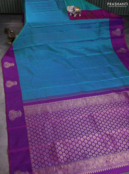 Pure kanchipuram silk saree cs blue and purple with allover zari woven checked pattern and zari woven butta border