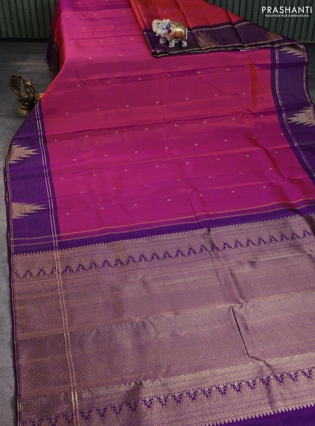 Pure kanchipuram silk saree dual shade of pinkish orange and purple with zari woven buttas and zari woven temple design border