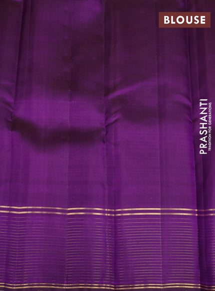 Pure kanchipuram silk saree dual shade of pinkish orange and purple with zari woven buttas and zari woven temple design border
