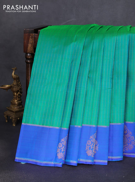 Pure kanchipuram silk saree teal green and blue with allover zari stripe pattern and zari woven butta border