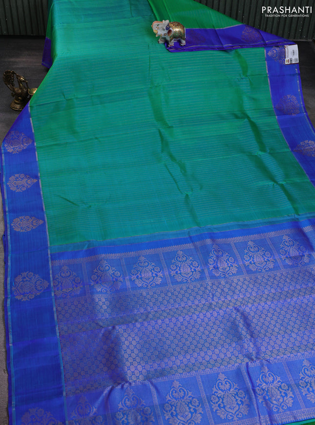 Pure kanchipuram silk saree teal green and blue with allover zari stripe pattern and zari woven butta border