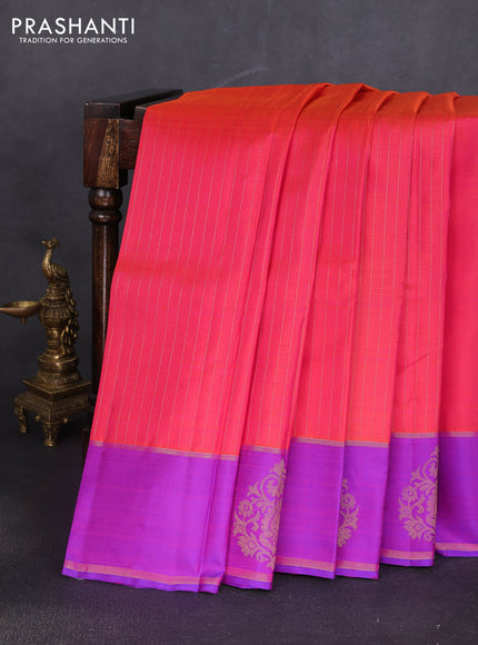 Pure kanchipuram silk saree dual shade of orange and purple with allover zari stripe pattern and zari woven butta border