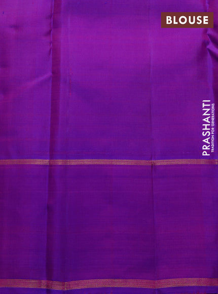 Pure kanchipuram silk saree dual shade of orange and purple with allover zari stripe pattern and zari woven butta border