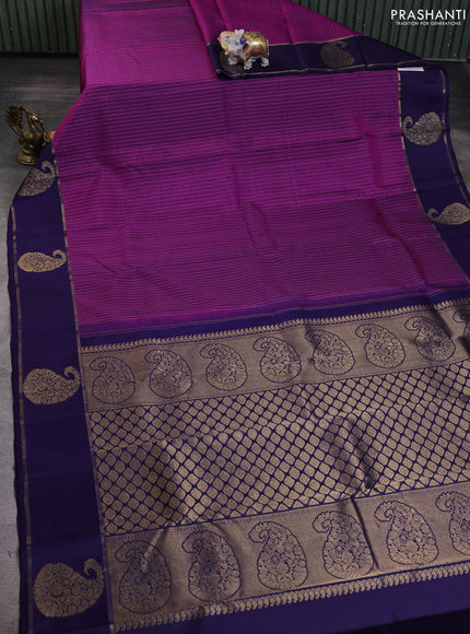 Pure kanchipuram silk saree purple and dark blue with allover zari stripe pattern and zari woven paisley butta border