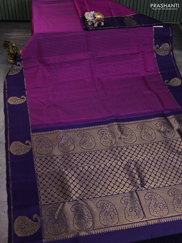 Pure kanchipuram silk saree purple and dark blue with allover zari stripe pattern and zari woven paisley butta border