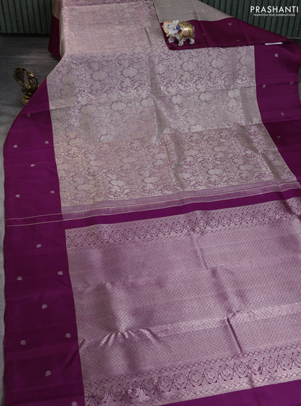 Pure kanchipuram silk saree dual shade of pastel grey and purple with allover zari woven brocade weaves and zari woven butta border