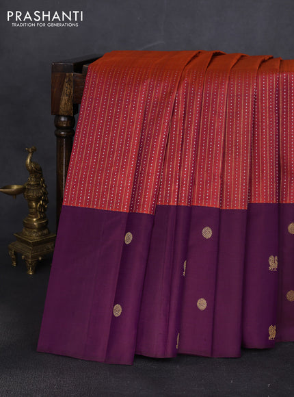 Pure kanchipuram silk saree rustic orange and deep purple with allover zari woven brocade weaves and zari woven butta border