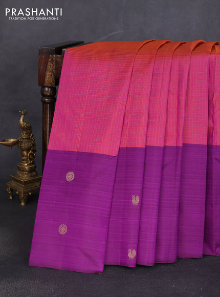 Pure kanchipuram silk saree dual shade of pinkish orange and purple with allover small zari checked pattern and long zari woven butta border