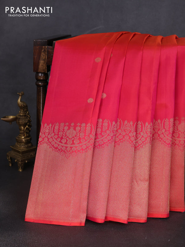 Pure kanchipuram silk saree dual shade of pinkish orange with annam & rudhraksha zari woven buttas and long zari woven border