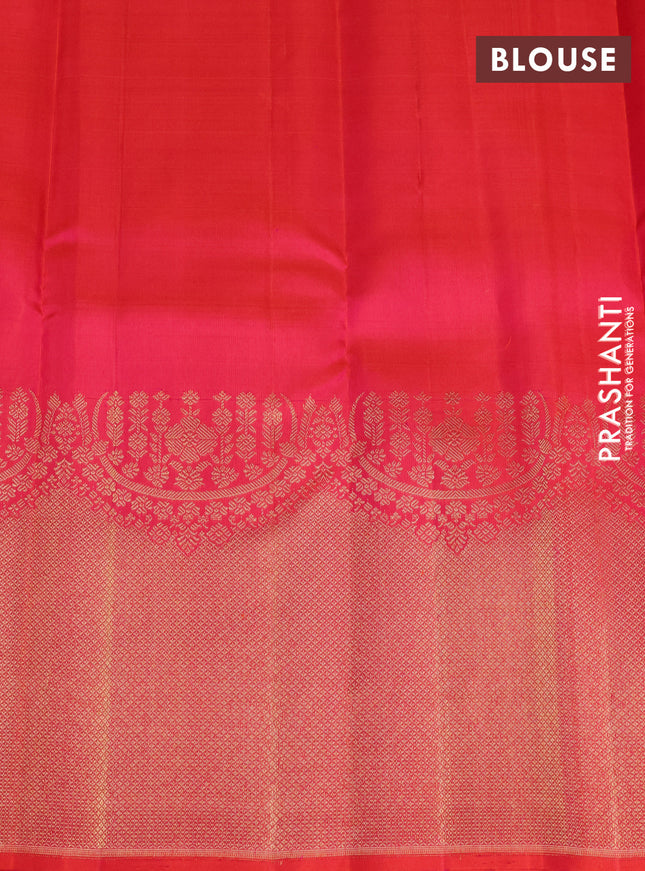 Pure kanchipuram silk saree dual shade of pinkish orange with annam & rudhraksha zari woven buttas and long zari woven border
