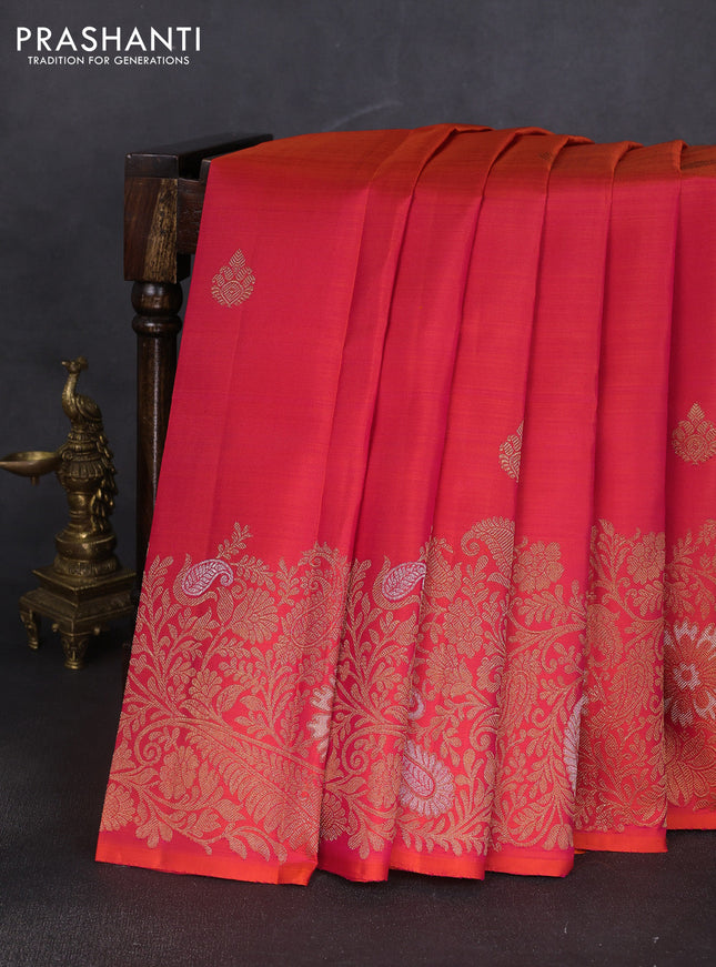 Pure kanchipuram silk saree dual shade of pinkish orange with zari woven buttas and long zari woven border