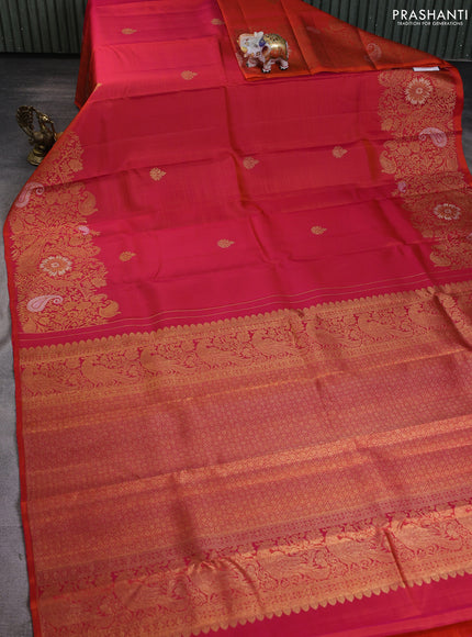 Pure kanchipuram silk saree dual shade of pinkish orange with zari woven buttas and long zari woven border