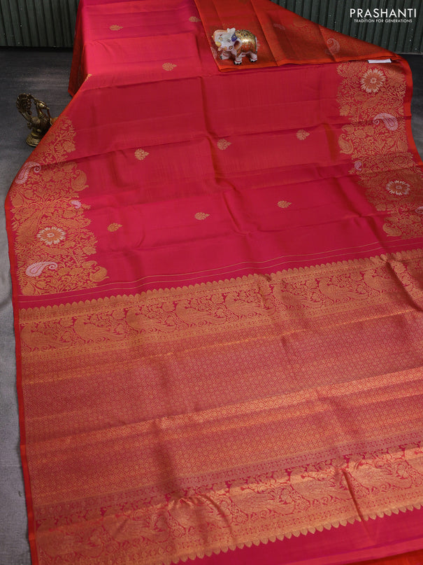 Pure kanchipuram silk saree dual shade of pinkish orange with zari woven buttas and long zari woven border