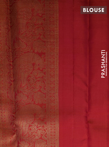 Pure kanchipuram silk saree dual shade of pinkish orange with zari woven buttas and long zari woven border