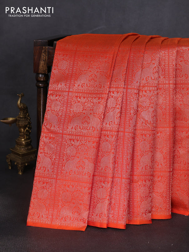 Pure kanchipuram silk saree orange with half & half style and long zari woven border
