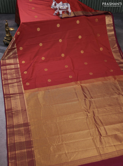 Semi kanchipuram silk saree rust shade and maroon with zari rudraksha buttas and zari woven border