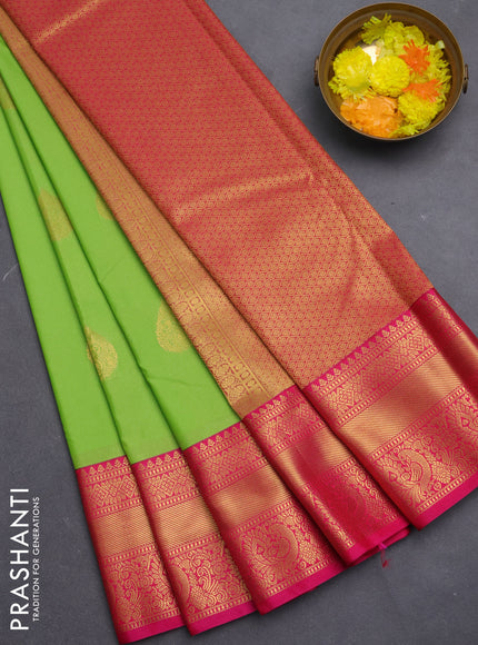 Semi kanchipuram silk saree light green and pink with zari woven buttas and zari woven korvai border