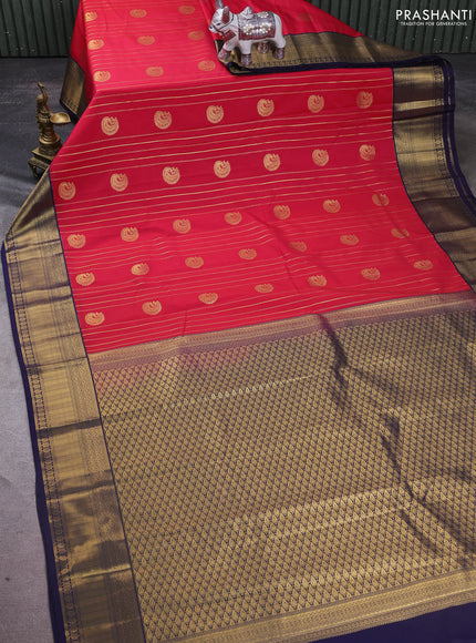 Semi kanchipuram silk saree pink and navy blue with allover zari stripes pattern & buttas and zari woven border
