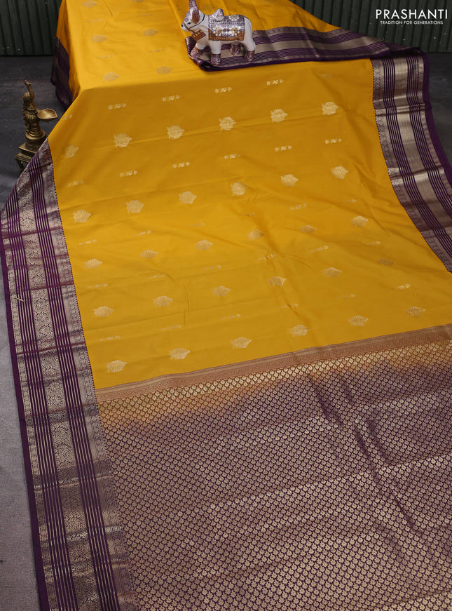 Semi kanchipuram silk saree yellow and purple with zari woven buttas and zari woven border