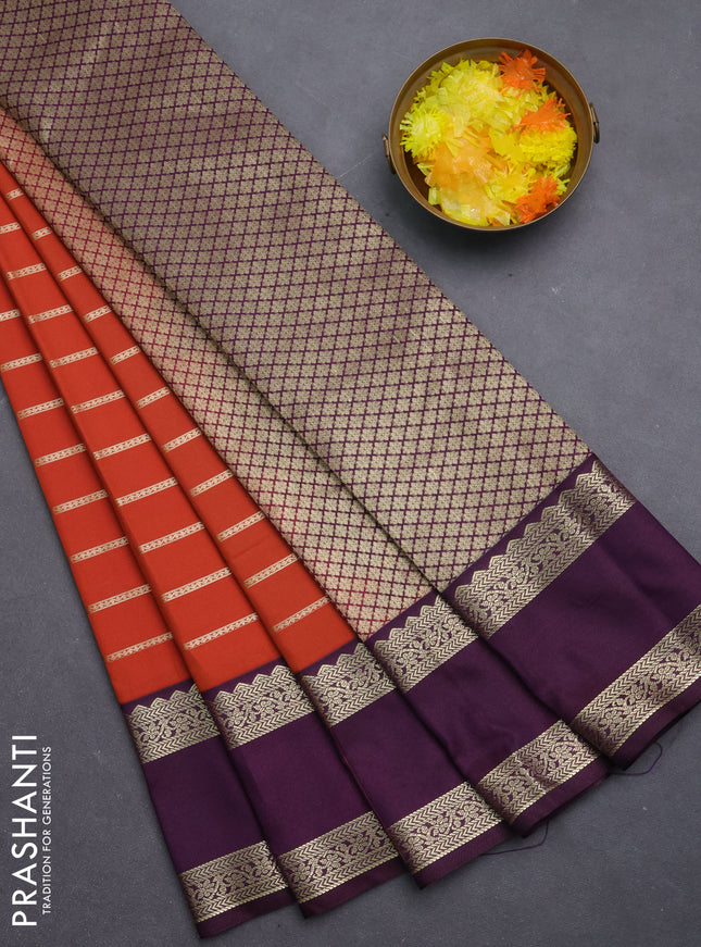 Semi kanchipuram silk saree rust shade and purple with allover zari weaves and rettapet zari woven korvai border