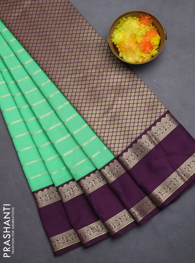 Semi kanchipuram silk saree green and purple with allover zari weaves and rettapet zari woven korvai border