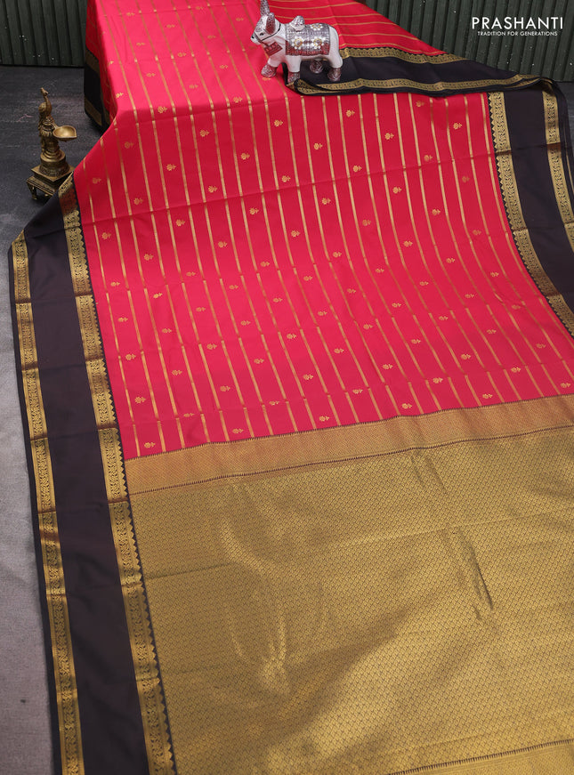 Semi kanchipuram silk saree pink and black with allover zari weaves and rettapet zari woven korvai border