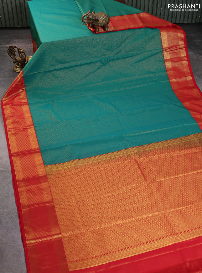 Semi kanchipuram silk saree green and red with allover zari weaves and rich zari woven border